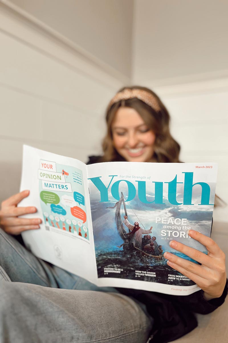 Young Women reading For The Strength of Youth Magazine 